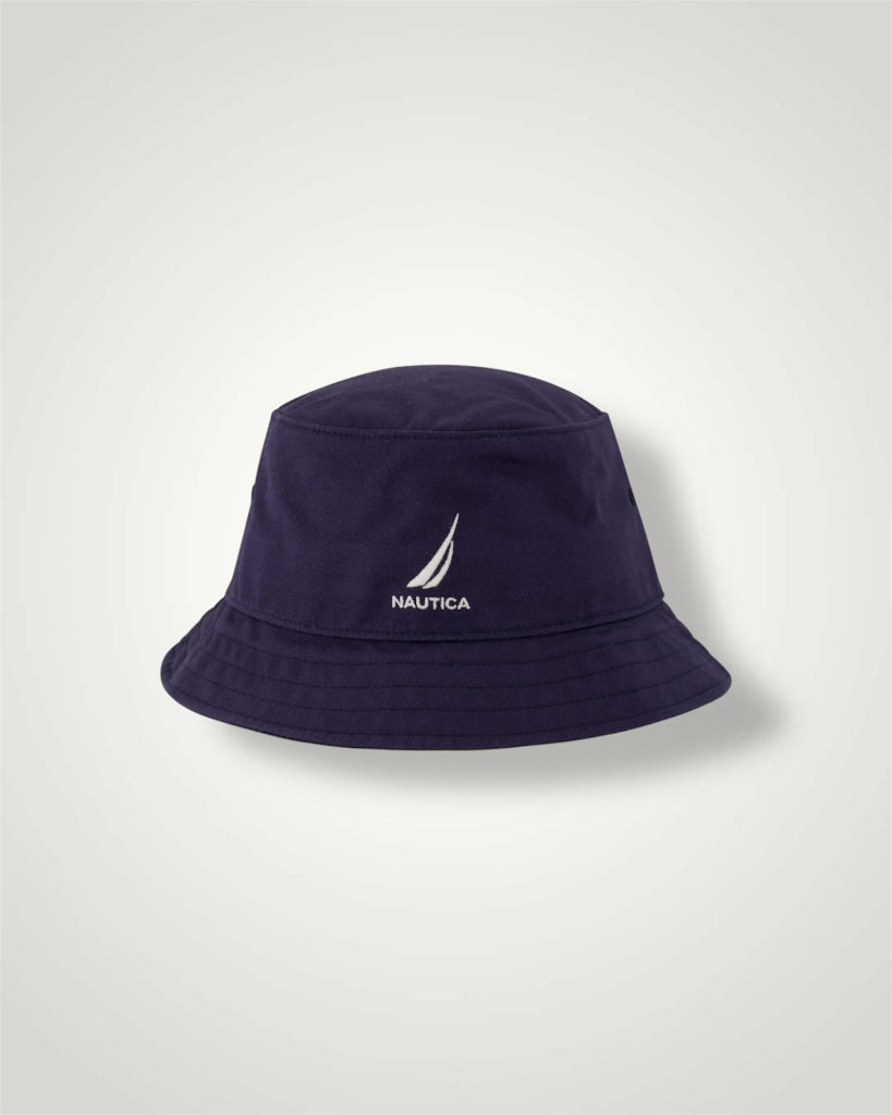 Navy bucket hat with Nautica logo on a light gray background