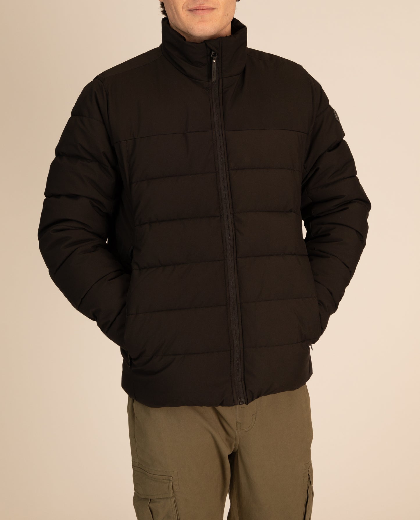 Trip Puffer Jacket in Black