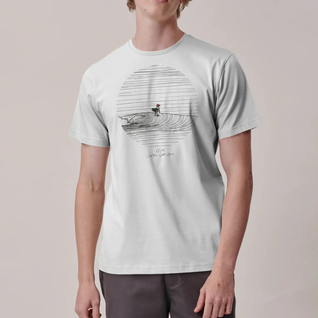 Person wearing a light gray t-shirt with a graphic design on a plain background