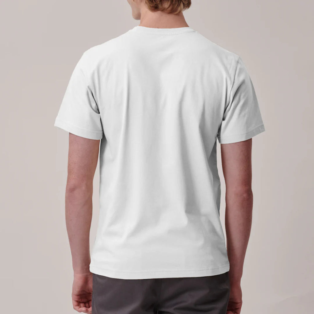 Person wearing a plain white t-shirt on a light gray background