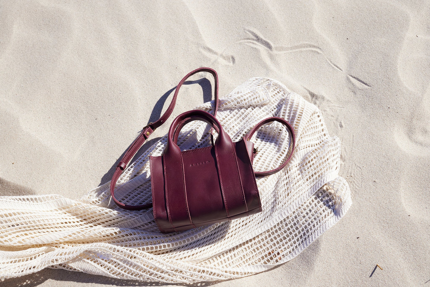 Berkley Leather Mini Crossbody Shopper in Merlot