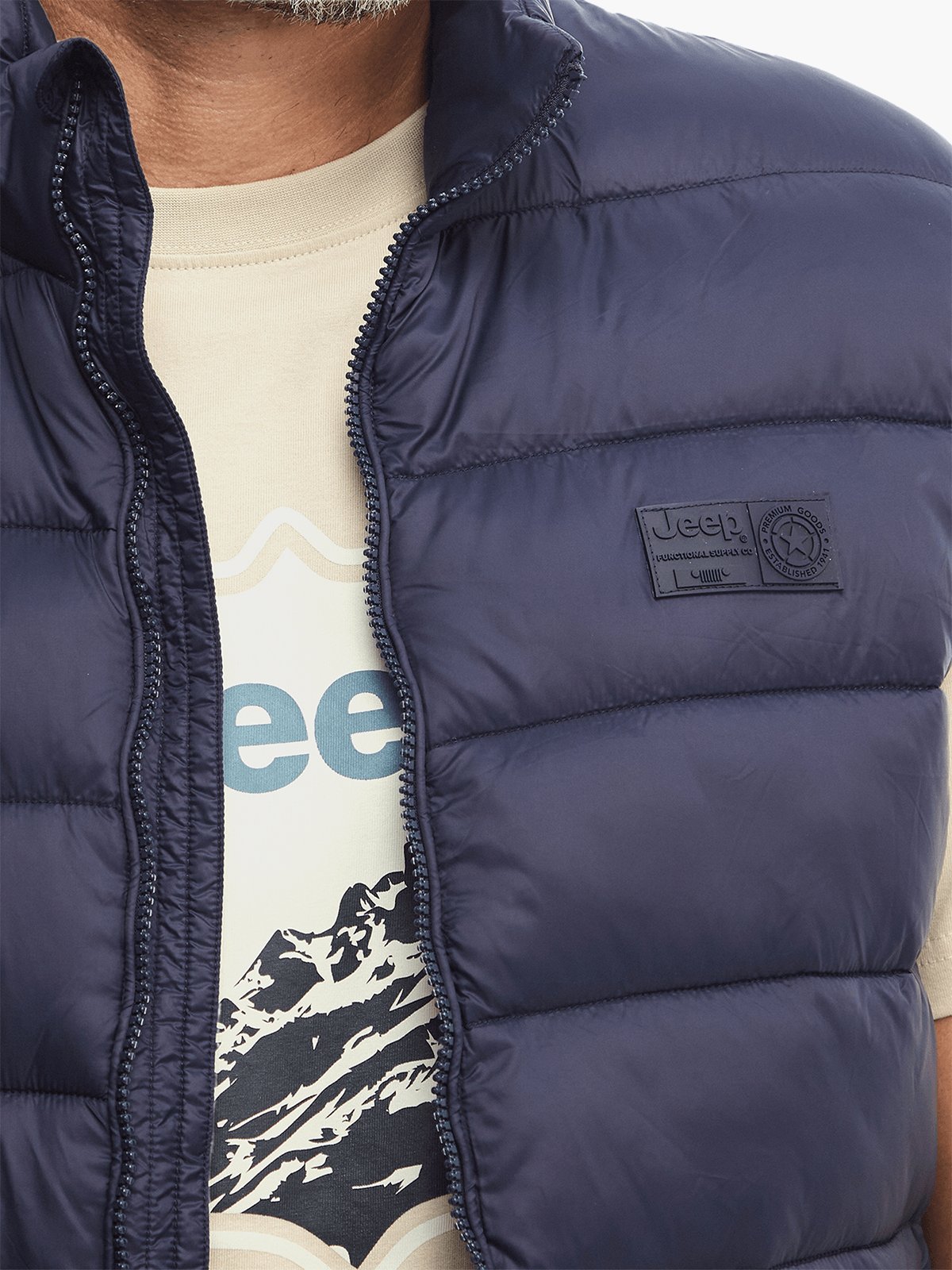 Core Sleeveless Puffer Jacket in Navy