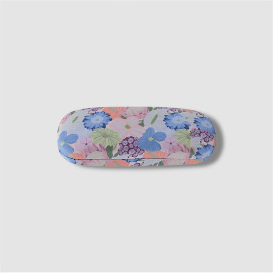 Floral-patterned glasses case on a light gray background