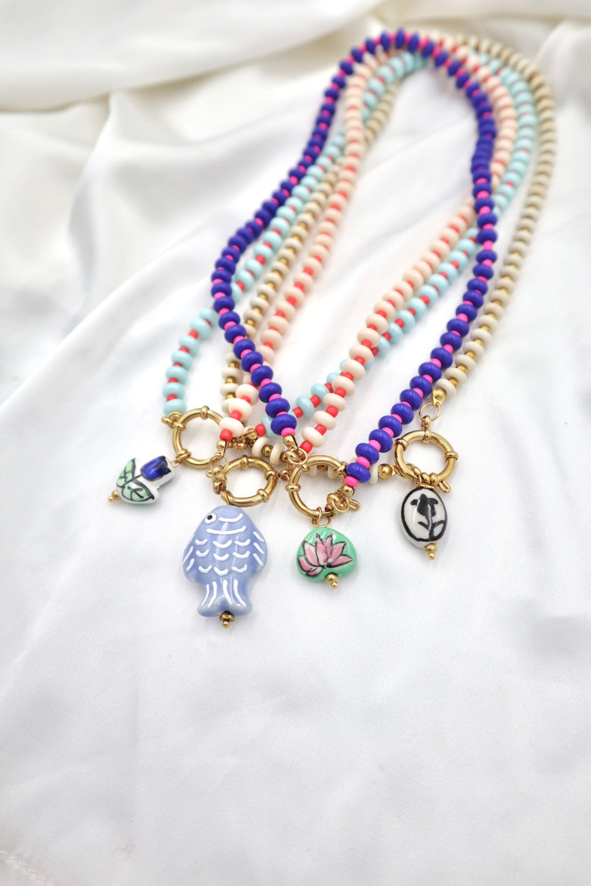 Lisboa Two Tone Charm Necklace in Cream / Red / Fish