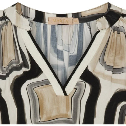 Patterned Dress with a visible brand label on a white background