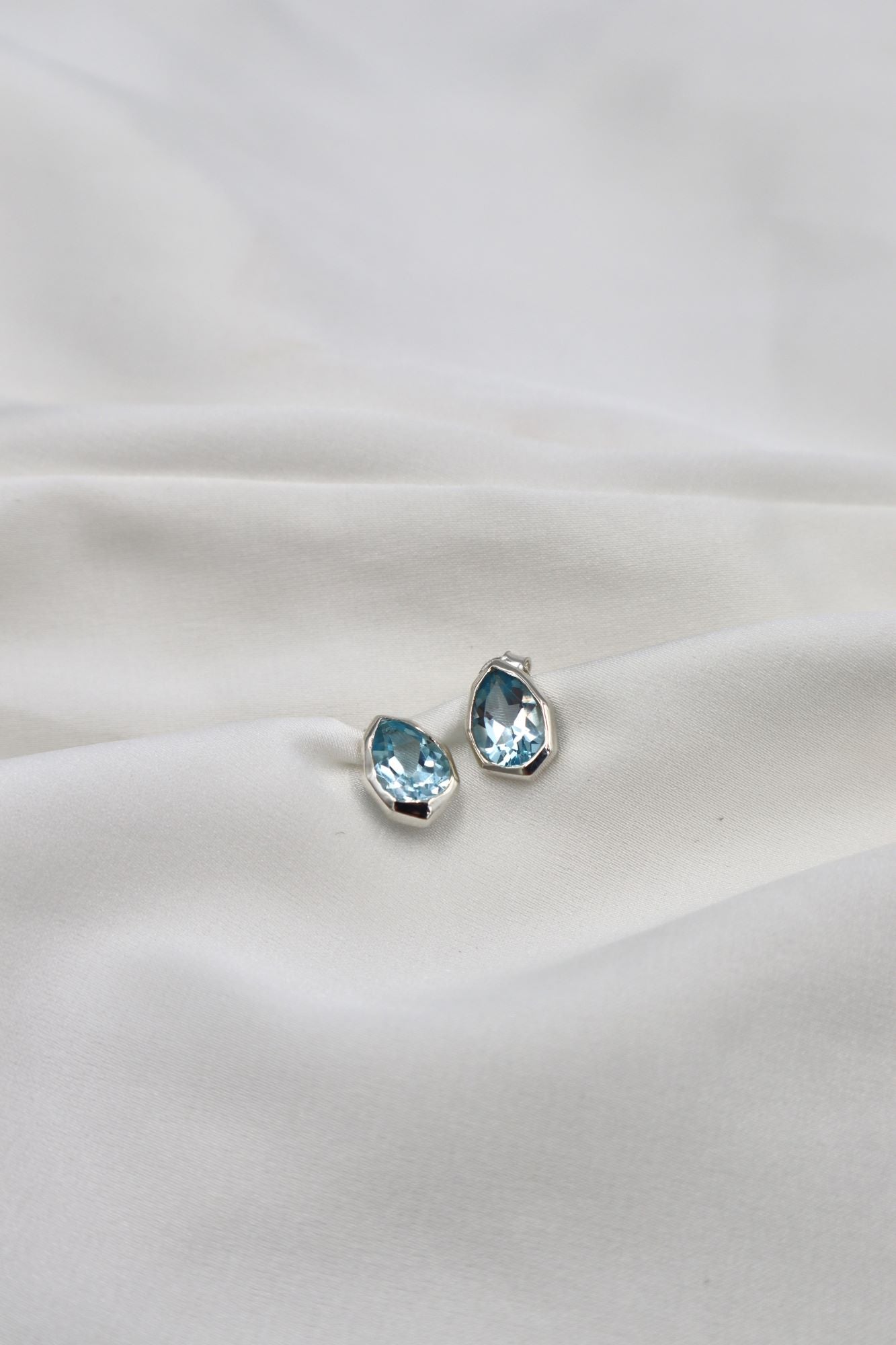 Sterling Silver Faceted Blue Topaz Stud Earrings