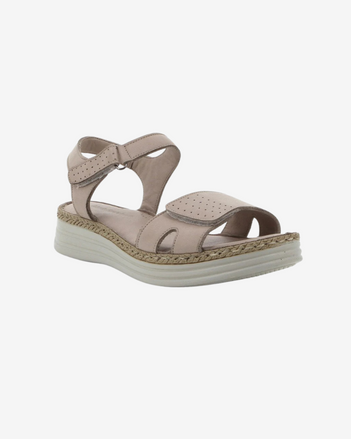Beige sandal with a white sole on a light beige background