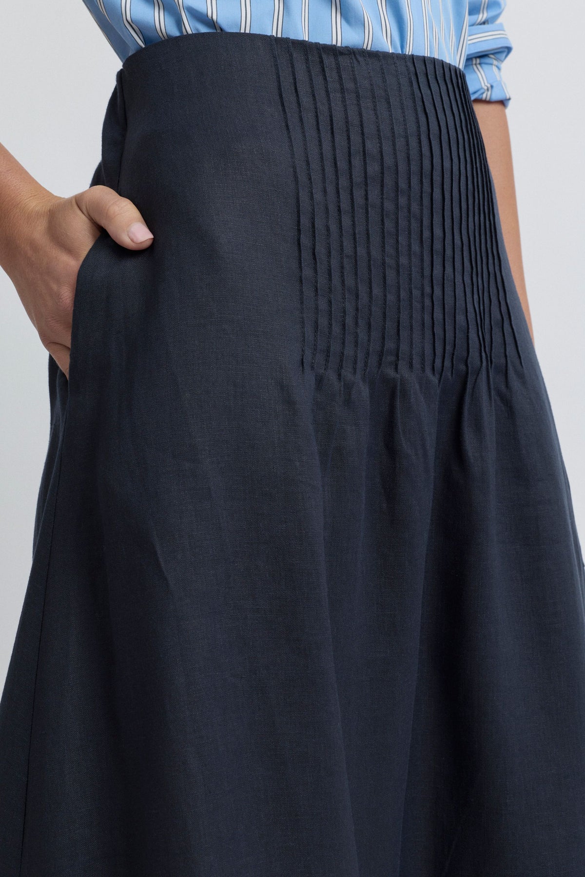 Tirari Pintuck Skirt in Navy